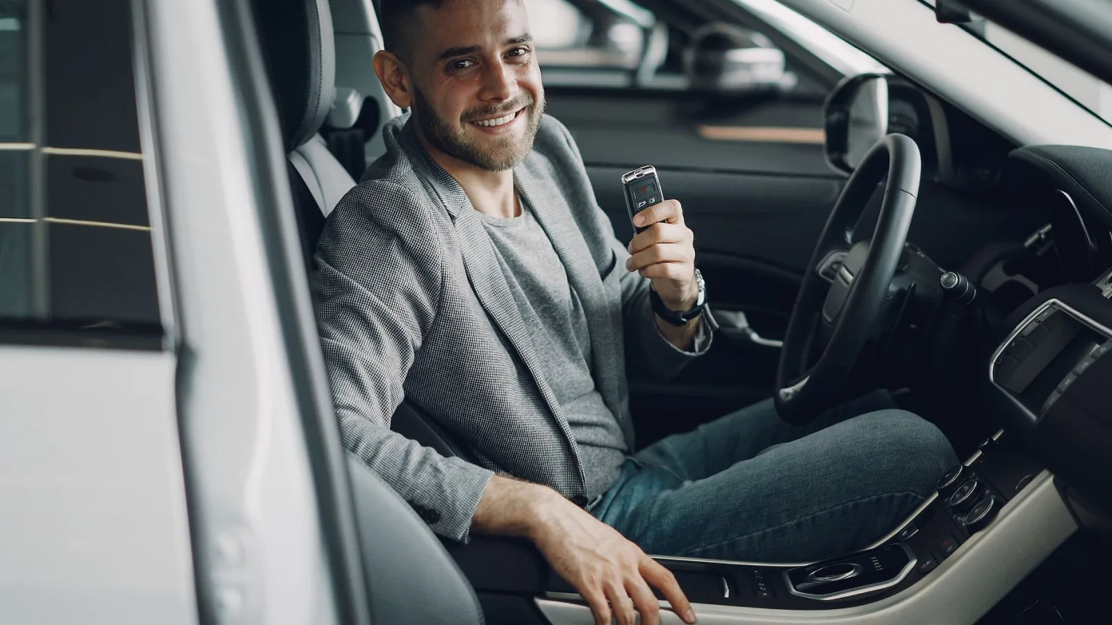 Car and keys on table, symbolising vehicle theft