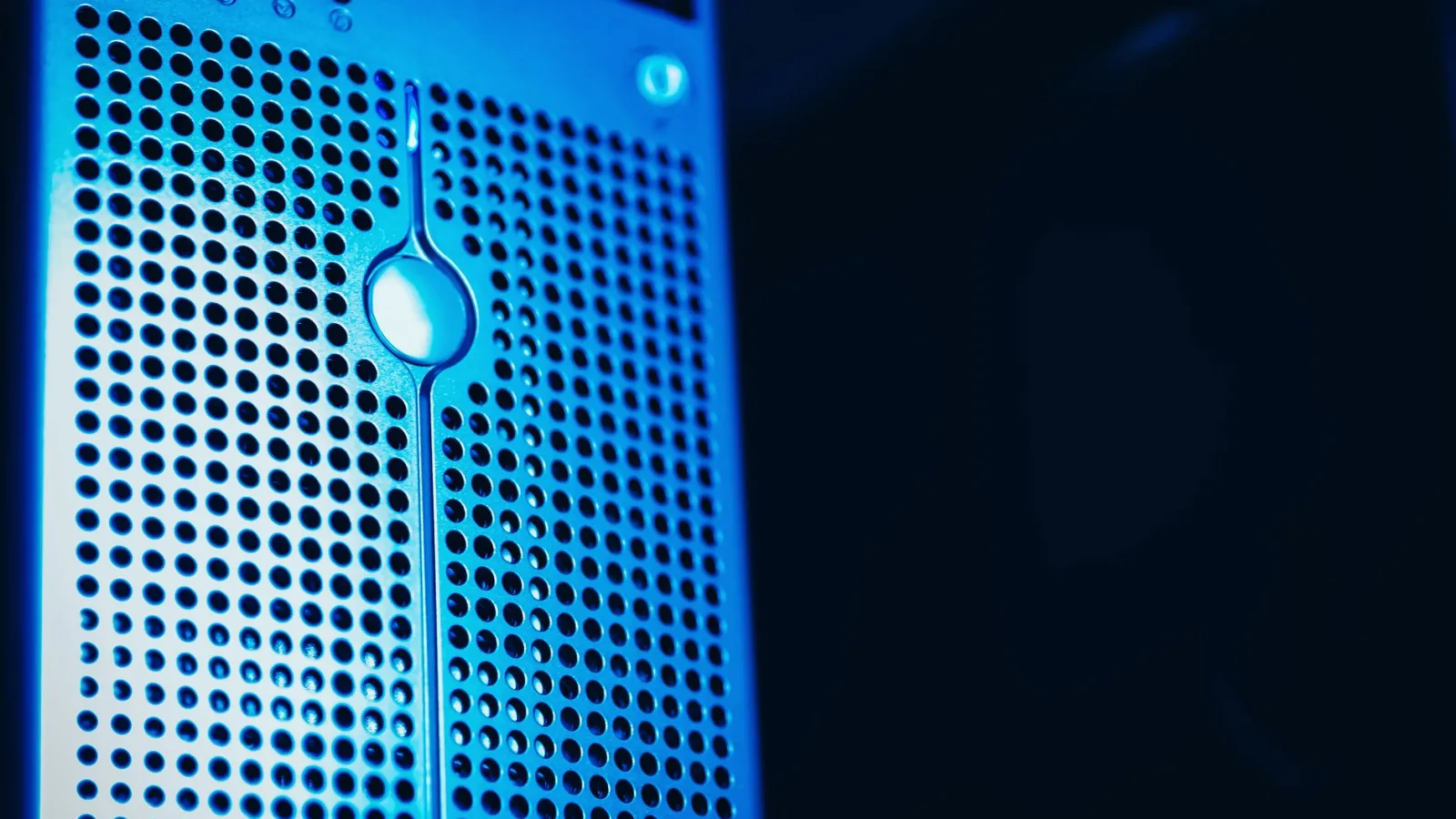 Modern server rack with blue lighting in a secure data center environment.