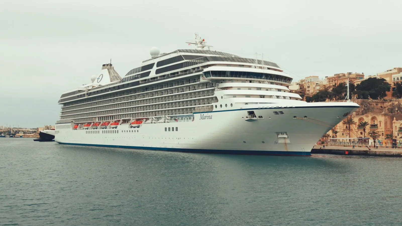 A luxurious cruise ship, MS Marina, moored in Valletta, Malta's scenic harbor.