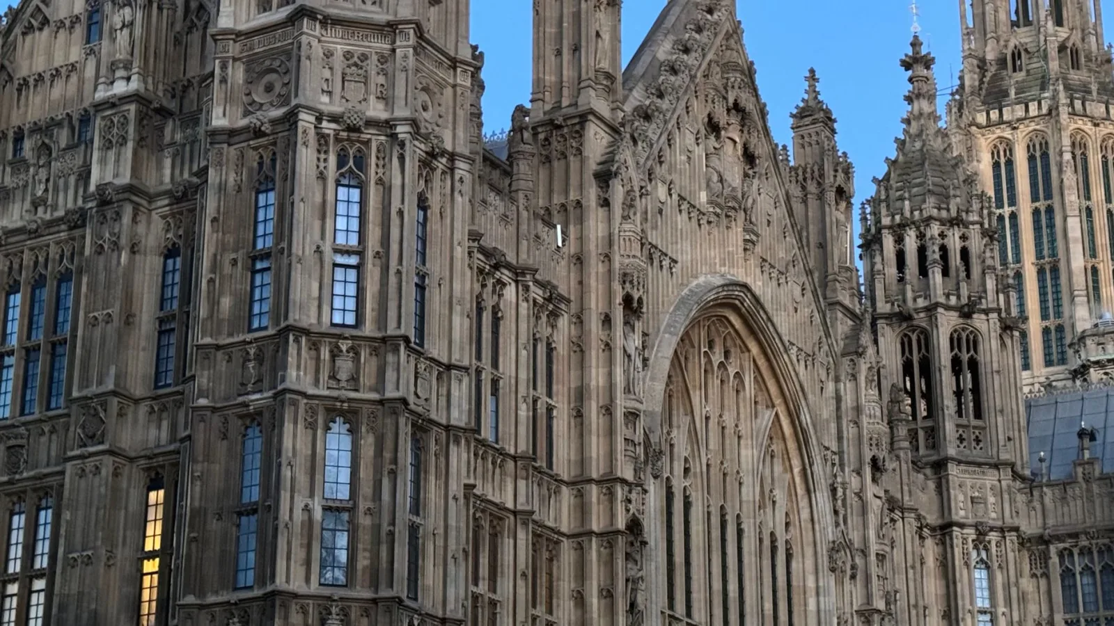 Close-up view of the intricate Gothic architecture of Westminster Palace in London.