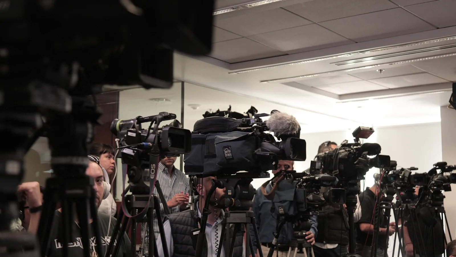 Trevor Phillips speaking in newsroom studio
