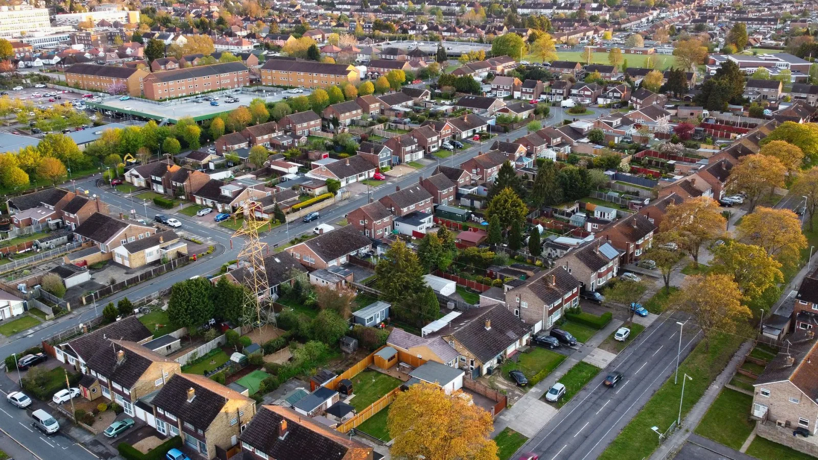 Aerial view of a suburban neighborhood in Luton, England during autumn.