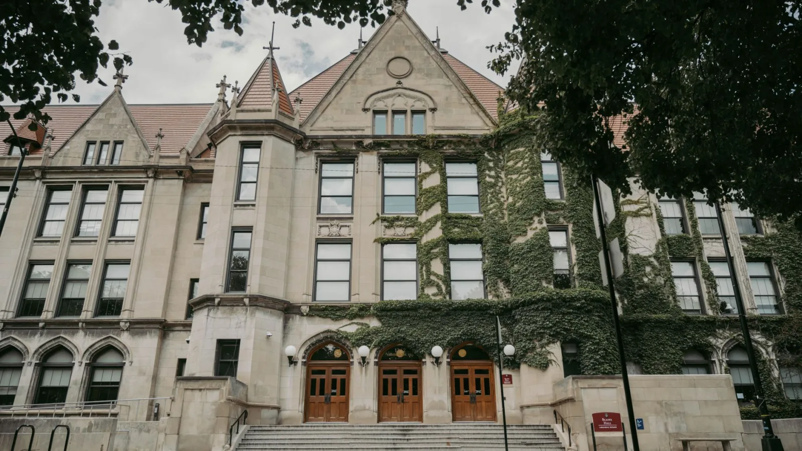 Majestic ivy-covered Gothic architecture of a historic university building in Chicago.